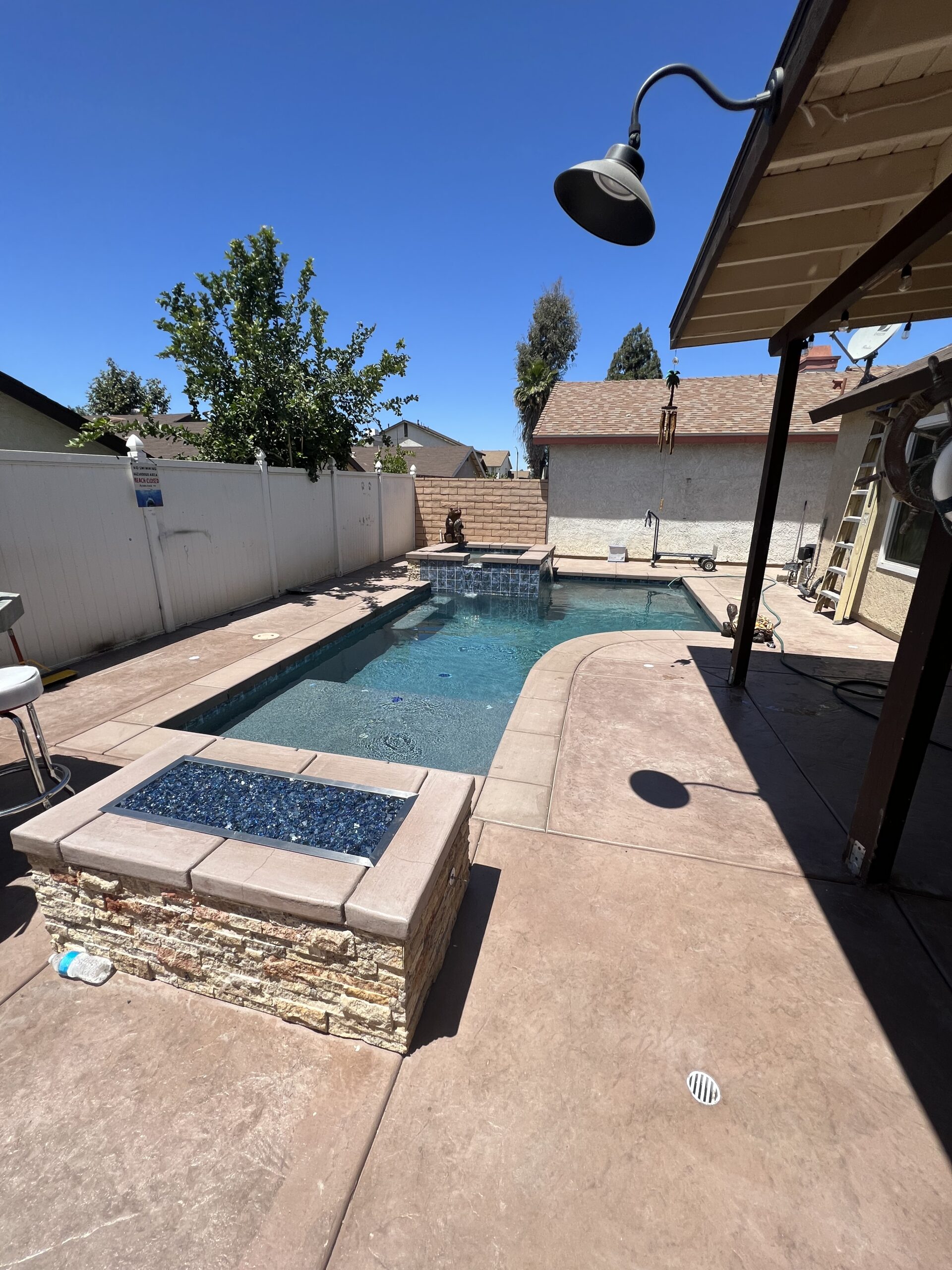 Backyard swimming pool and spa at residential home in Moreno Valley CA